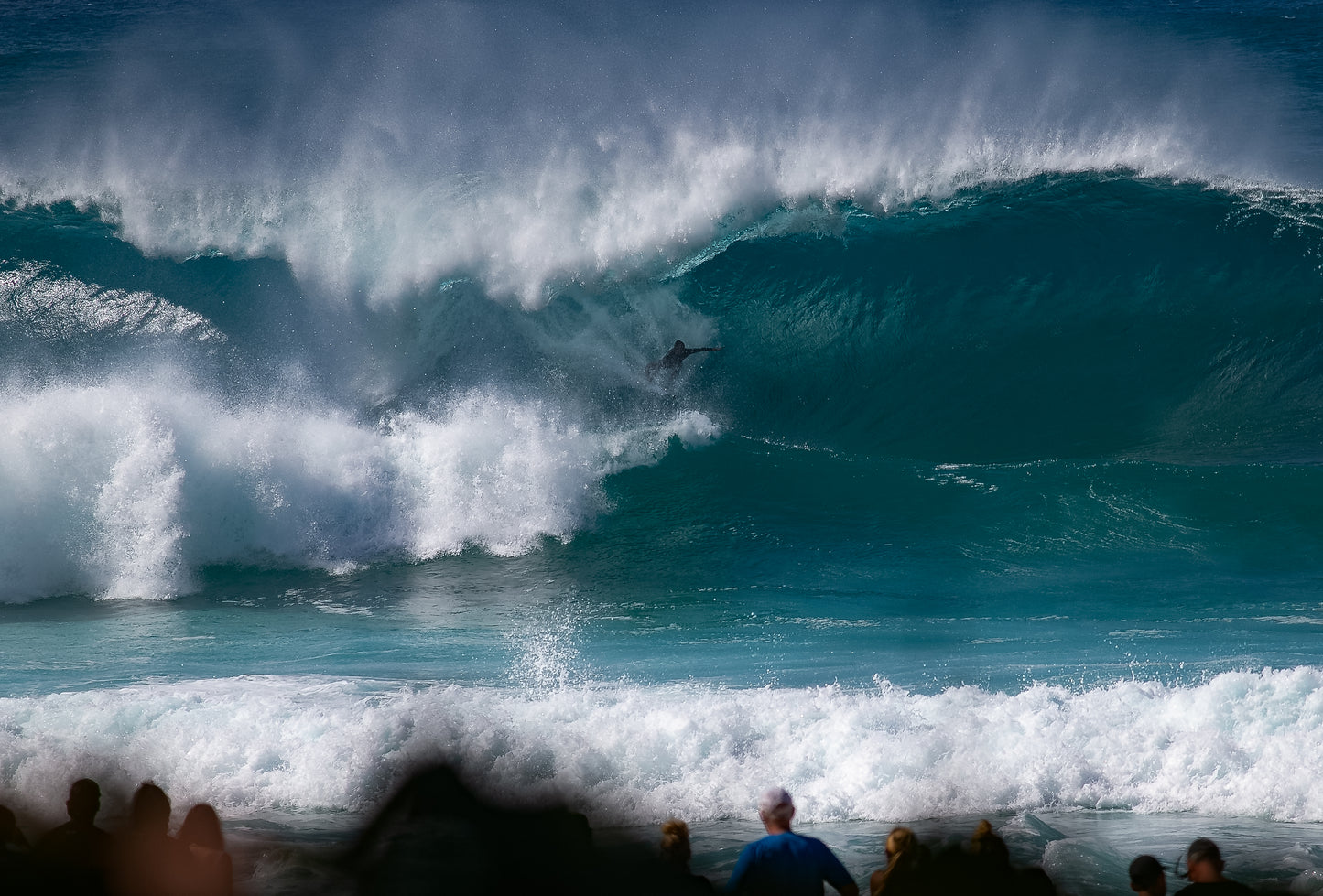 xp Surfer setting himself deep in the barrel after an amazing drop at Pipeline