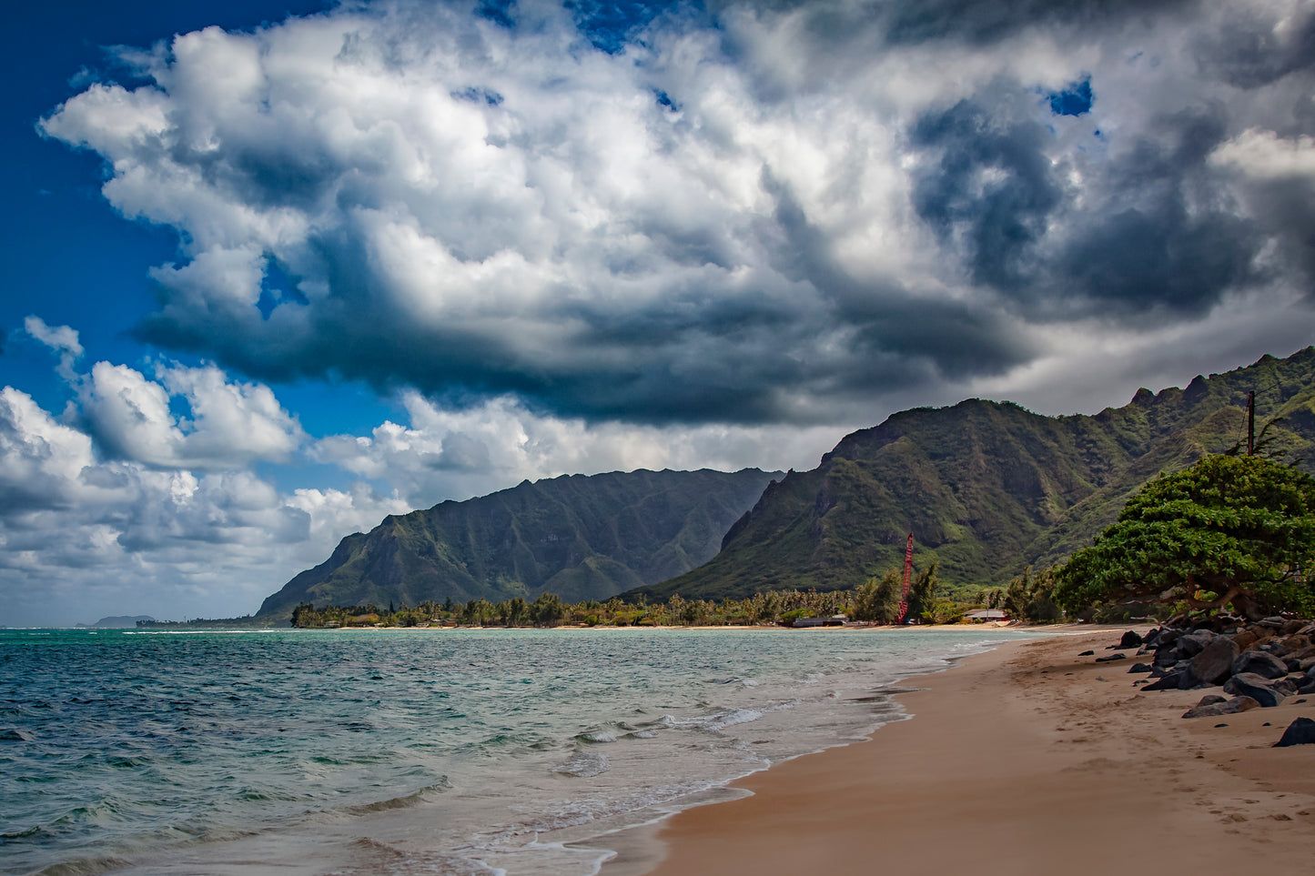 r Beautiful Storm clouds rolling in over beautiful Hawaiian mountains near Punalu